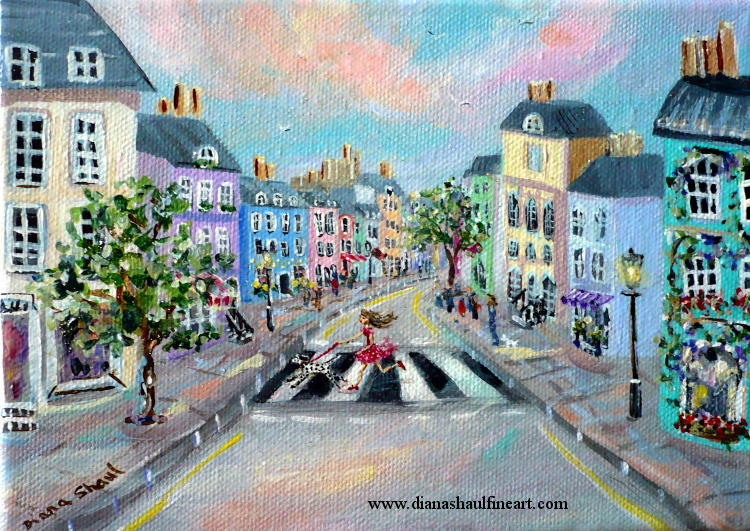 A young woman is pulled across a pretty street of pastel-coloured shops and houses by her Dalmatian.