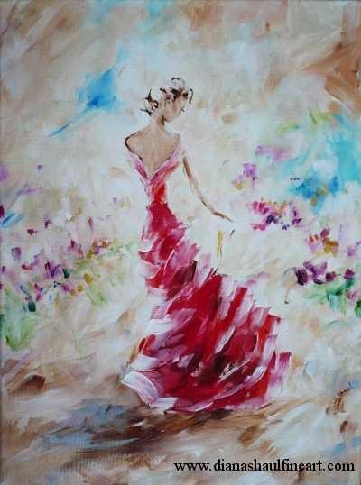 A woman in a red gown finds wild flowers blooming in the desert.